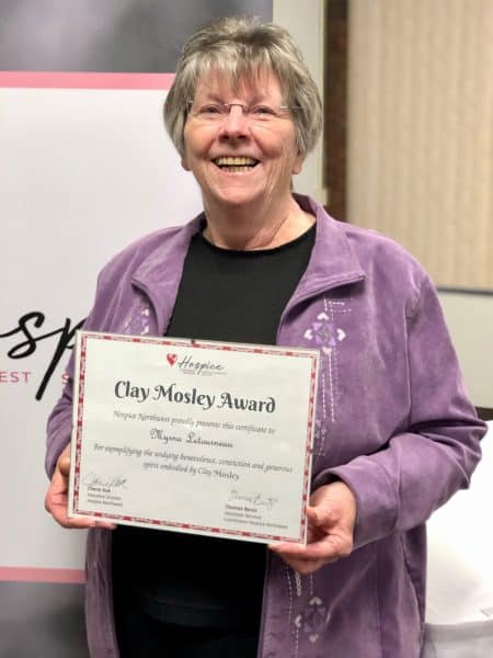 Myrna L winning the Clay Mosley Award