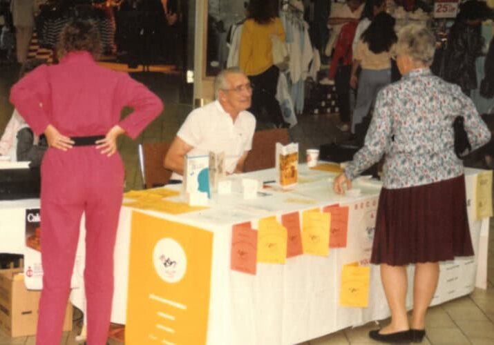 Table set up in a small recruiting volunteers for Hospice Northwest